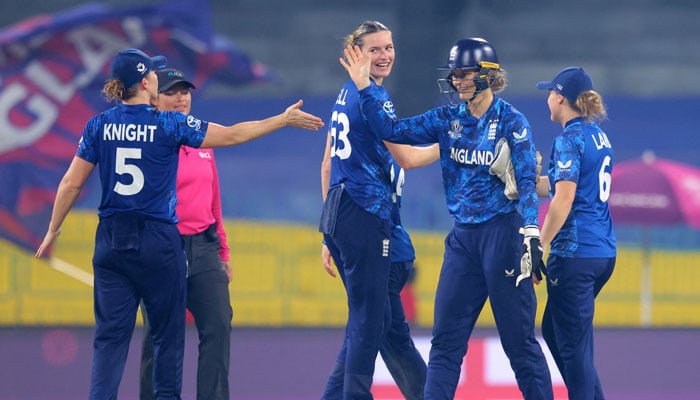 Englands Amy Jones, Heather Knight, Lauren Bell, and teammates celebrate after the match at R Premadasa International Cricket Stadium, Colombo, Sri Lanka on October 11, 2025. — Reuters