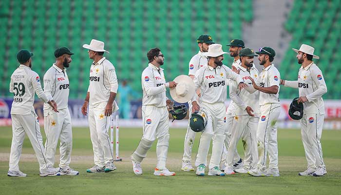 Pakistan players celebrate after a strong finish on day two of the first Test against South Africa, Gaddafi Stadium, Lahore, on October 13, 2025. — PCB