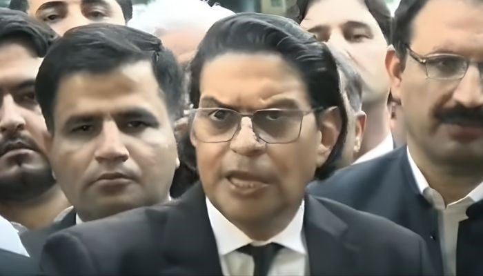 Pakistan Tehreek-e-Insaf (PTI) Secretary General Salman Akram Raja talks to journalists outside Peshawar High Court on October 13, 2025. — YouTube/Geo News/screengrab