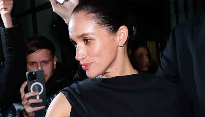 Meghan left red-faced after friend reveals truth about Paris Fashion Week invite