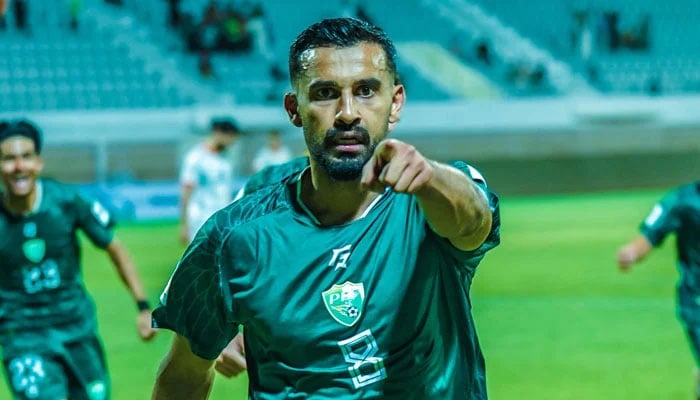 Pakistans Etzaz Hussain celebrates scoring a goal during their AFC Asian Cup Qualifiers match against Afghanistan at the Ali Subah Al-Salem Stadium in Al-Ardiya on October 14, 2025. — PFF