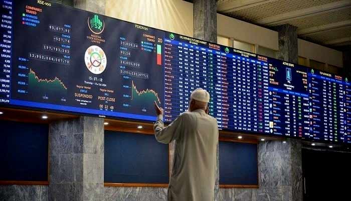 A broker is seen speaking to someone on phone at the Pakistan Stock Exchange (PSX) in Karachi on Thursday, October 17, 2024. — PPI