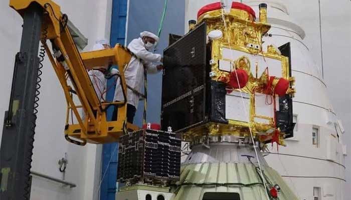 This file photo shows Suparco official working on Pakistans first homegrown electro-optical (EO-1) satellite before its launching. — Facebook/@SUPARCOPakistan