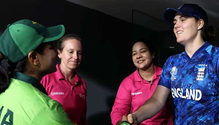 Pakistans Fatima Sana (left) and Englands Nat Sciver-Brunt (right) after their ICC Womens match gets called off at the R Premadasa Stadium in Colombo on October 15, 2025. — ICC