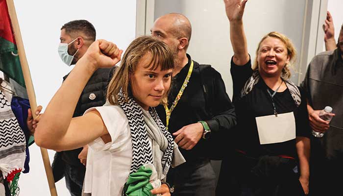 Swedish activist Greta Thunberg, who was part of the Global Sumud Flotilla seeking to deliver aid to Gaza and was detained by Israel, gestures as she is greeted by supporters upon her arrival to the Athens Eleftherios Venizelos International Airport, in Athens, Greece, October 6, 2025. — Reuters