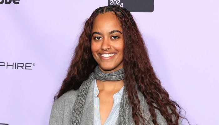 Malia Ann Obama being told to act mature