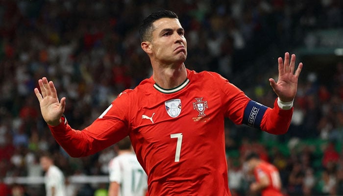 Portugals Cristiano Ronaldo celebrates scoring their first goal against Hungary during the FIFA World Cup - UEFA Qualifiers in Estadio Jose Alvalade, Lisbon, Portugal - October 14, 2025. — Reuters