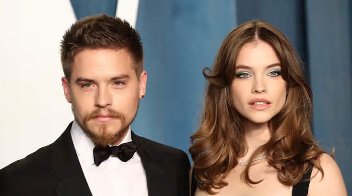 Dylan Sprouse reveals wife Barbara Palvin walked on broken foot at VS show