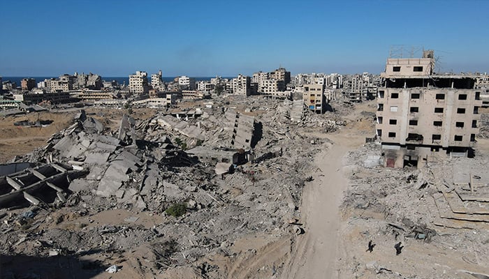 An aerial view shows the Al-Maqussi Towers district, heavily damaged by massive Israeli bombardment over the past two years, in northwestern Gaza City on October 15, 2025. — AFP