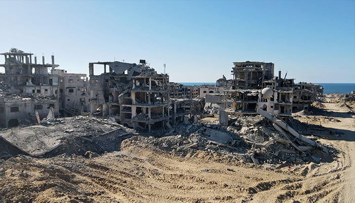 An aerial view shows the Al-Maqussi Towers district, heavily damaged by massive Israeli bombardment over the past two years, in northwestern Gaza City on October 15, 2025. — AFP