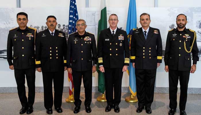 Chief of  Naval Staff Admiral Naveed Ashraf in a group photo with National Defence University (NDU) President Vice Admiral Peter A Garvin and others during his visit to US. Image released on October 17, 2025 — Directorate General Public Relations (Pakistan Navy)