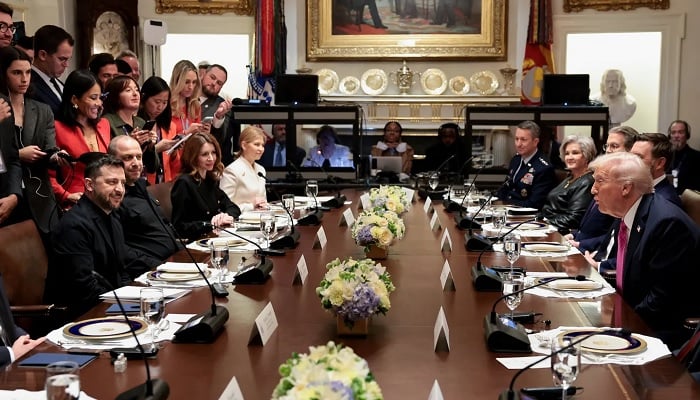 US President Donald Trump meets with Ukrainian President Volodymyr Zelensky (L) in the Cabinet Room of the White House in Washington, DC, on October 17. — AFP