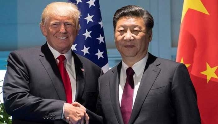 President Donald Trump and Chinese President Xi Jinping shake hands prior to a meeting on the sidelines of the G20 Summit in Hamburg, Germany on July 8, 2017. — Reuters