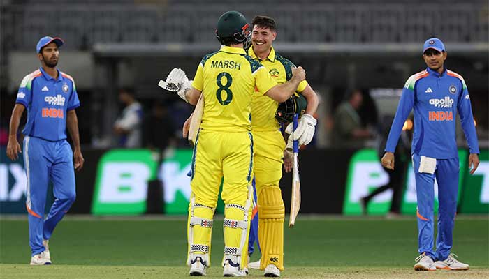 Australias Mitchell Marsh and Matthew Renshaw celebrate their victory during the first ODI cricket match between Australia and India in Perth on October 19, 2025. — AFP