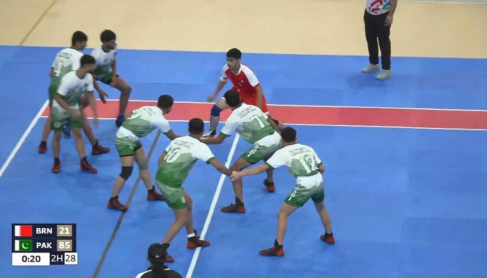 Pakistani kabaddi players in action against hosts Bahrain during their opening match at the Asian Youth Games. — Reporter