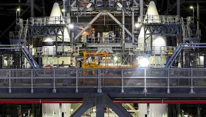 Scaffolding surrounds the Artemis solid rocket boosters inside the Vehicle Assembly Building High Bay 3 during a Nasa media day event at the Kennedy Space Center in Cape Canaveral, Florida, US, March 7, 2025.—Reuters
