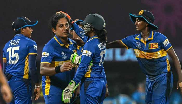 Sri Lankas Chamari Athapaththu (second from left) celebrates with teammates after winning their ICC Womens World Cup match against Bangladesh at the Dr DY Patil Sports Academy in Navi Mumbai on October 20, 2025. — AFP
