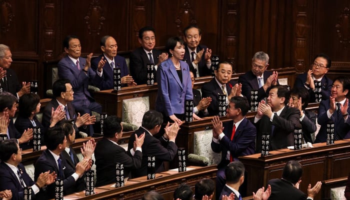 Leader of Japans ruling Liberal Democratic Party (LDP) Sanae Takaichi reacts as she receives applause after being elected as prime minister, at the Lower House of Parliament in Tokyo, Japan October 21, 2025. — Reuters