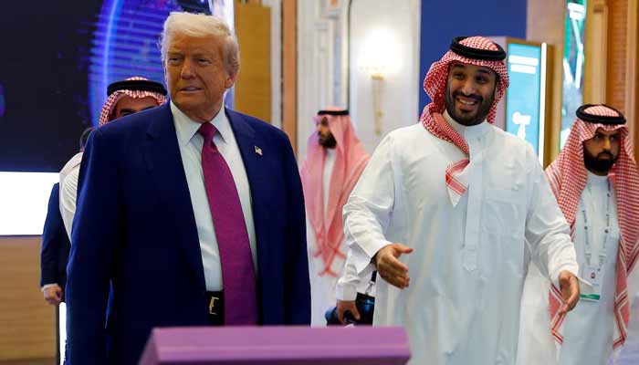Saudi Crown Prince Mohammed Bin Salman reacts next to US President Donald Trump during the Saudi-US Investment Forum, in Riyadh, Saudi Arabia, May 13, 2025.— Reuters