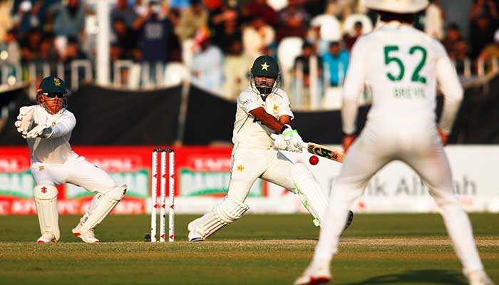 Pakistans Babar Azam plays a shot during the third day of the second Test cricket match between Pakistan and South Africa at the Rawalpindi Cricket Stadium on October 22, 2025. — PCB