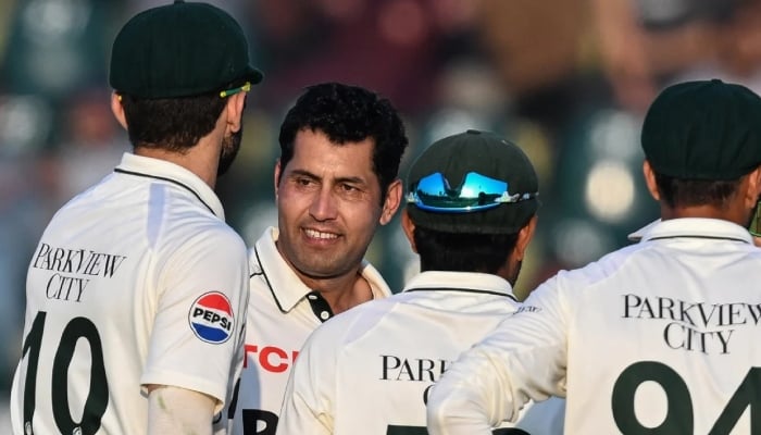 Asif Afridi celebrates with his teammates after taking a wicket during the third day of the second Test cricket match between Pakistan and South Africa at the Rawalpindi Cricket Stadium in Rawalpindi on October 22, 2025. — AFP