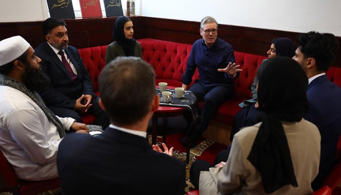 Britain’s Prime Minister Keir Starmer interacts with members of the Muslim community during his visit to Peacehaven Mosque in East Sussex. — reporter