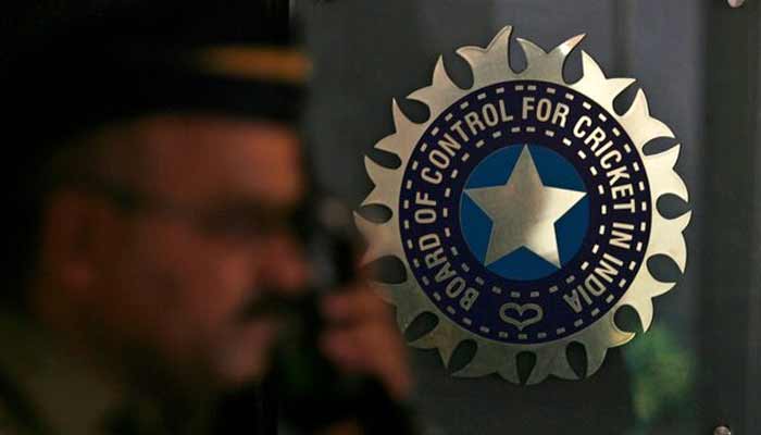 A policeman walks past a logo of the Board of Control for Cricket in India (BCCI) during a governing council meeting of the Indian Premier League (IPL) at BCCI headquarters in Mumbai April 26, 2010.— Reuters