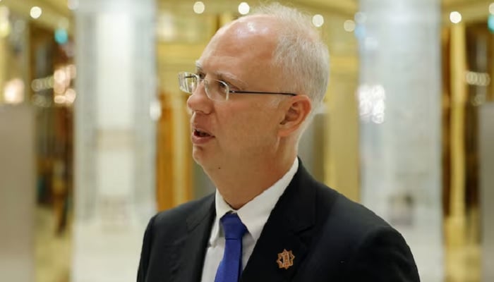 The head of Russias sovereign wealth fund, Kirill Dmitriev, speaks to members of the delegation and journalists after the US-Russia talks in Riyadh, Saudi Arabia, February 18, 2025. — Reuters