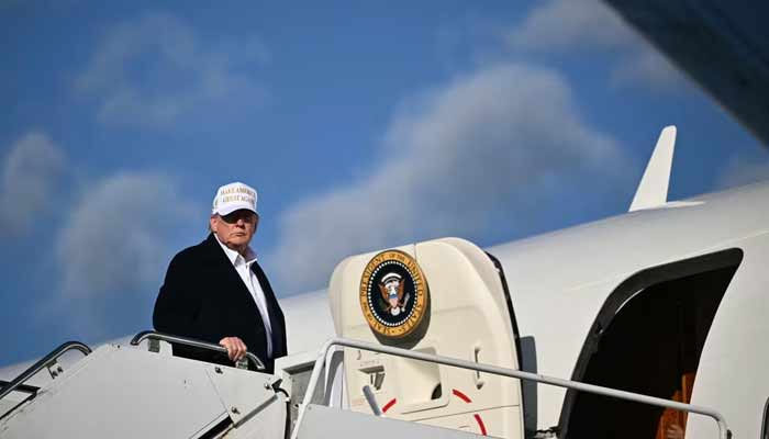 US President Donald Trump boards Air Force One in Morristown, New Jersey, on April 27, 2025. — AFP