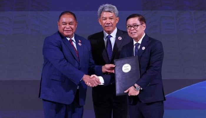 Timor-Lestes Foreign Minister Bendito Freitas, Malaysias Foreign Minister Mohamad Hasan and Thailands Foreign Minister Sihasak Phuangketkeow attend a ceremony for the accession of Timor-Leste to the ASEAN charter in Kuala Lumpur, Malaysia October 25, 2025. — Reuters