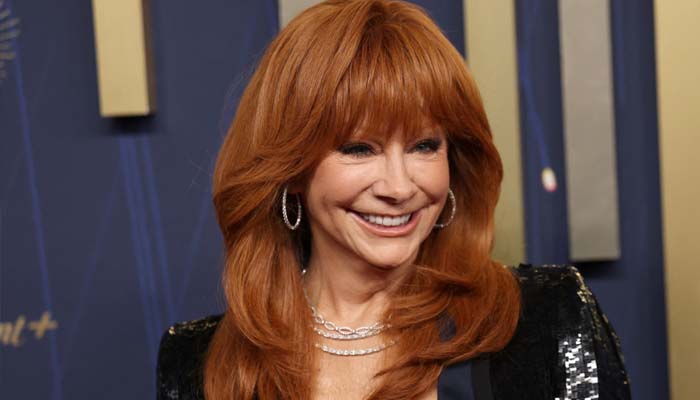 Reba McEntire reveals toilet seat cover keeps her ‘grounded’