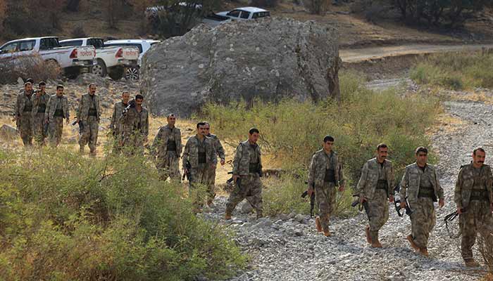 Fighters with the Kurdistan Workers Party (PKK) walk for a disarmament ceremony marking a significant step toward ending the decades-long conflict between Turkiye and the outlawed group in the Qandil mountains, Iraq October 26, 2025. — Reuters