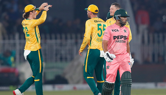 Pakistans Usman Khan walking back to the pavilion after being bowled out during the first T20I match against South Africa at Rawalpindi Cricket Stadium on October 28, 2025. — PCB