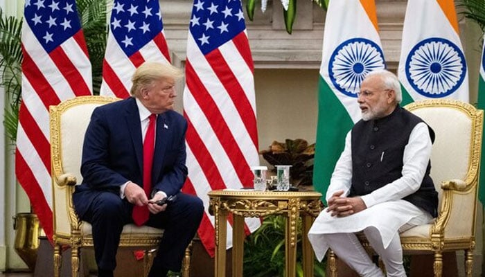 Indian Prime Minister Narendra Modi speaks to U.S. President Donald Trump during a meeting at Hyderabad House in New Delhi, India, February 25, 2020. — Reuters