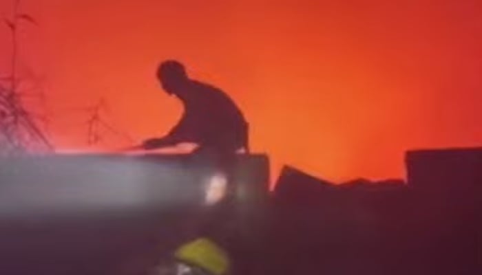 Rescue workers on a search and rescue operation during a fire near Karachi University, October 28, 2025. — Screengrab via YouTube/Geo News
