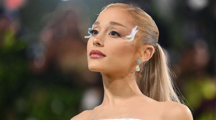 Ariana Grande drops BTS look at her 'Wicked' glam routine