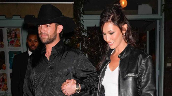 Bella Hadid, Adan Banuelos mark a year together with rare, intimate photos