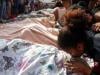 Corpses line Rio street, pushing death toll from police raids to 132