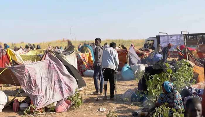 Displaced Sudanese gather and sit in makeshift tents after fleeing Al-Fashir city in Darfur, in Tawila, Sudan, October 29, 2025. — Reuters