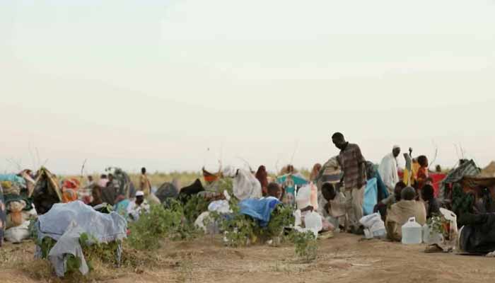 Displaced Sudanese gather and sit in makeshift tents after fleeing Al-Fashir city in Darfur, in Tawila, Sudan, October 29, 2025. — Reuters