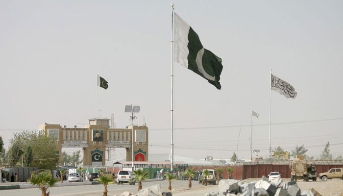 General view of Pakistan and Taliban flags at the Friendship Gate crossing point in the Pakistan-Afghanistan border town of Chaman, Pakistan August 27, 2021. — Reuters