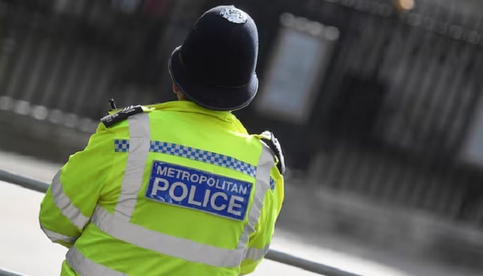 A Metropolitan Police officer stands on duty in Westminster, London, Britain, October 1, 2021. — Reuters