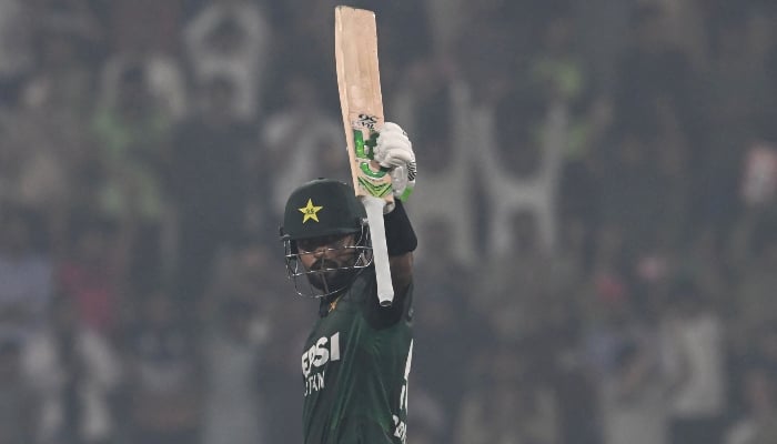 Pakistans Babar Azam celebrates his half century during the third and final Twenty20 international cricket match between Pakistan and South Africa at the Gaddafi Stadium in Lahore on November 1, 2025. — AFP