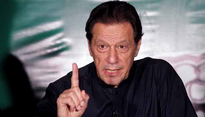 Former Prime Minister Imran Khan, gestures as he speaks to the members of the media at his residence in Lahore, on May 18, 2023. — Reuters