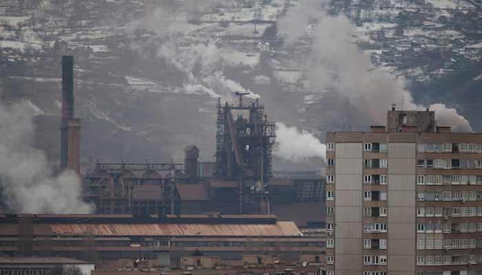 Thick smoke rises from the steel mill in the Zenica suburb of Tetovo in Zenica, Bosnia and Herzegovina.— Reuters