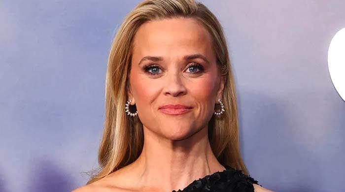 Reese Witherspoon drops her 50th birthday plans with son