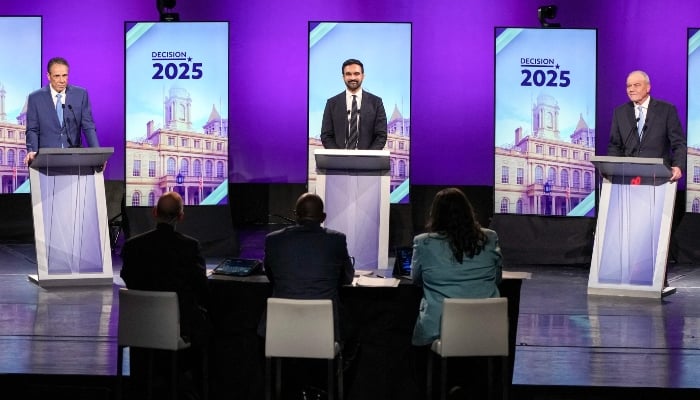 (L-R) Independent candidate and former New York Governor Andrew Cuomo, Democratic candidate Zohran Mamdani and Republican candidate Curtis Sliwa participate in the second New York City mayoral debate at LaGuardia Performing Arts Centre at LaGuardia Community College in Long Island City, Queens, New York, US, on October 22, 2025. — AFP