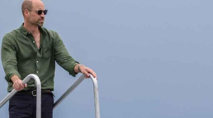Prince William looks dashing on a boat ride as he observes mangroves in Brazil 