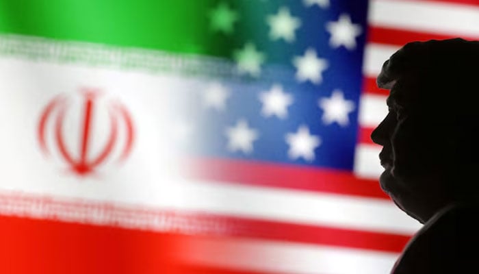 A 3D-printed miniature model of Donald Trump and the US and Iran flags are seen in this illustration taken January 15, 2025. — Reuters