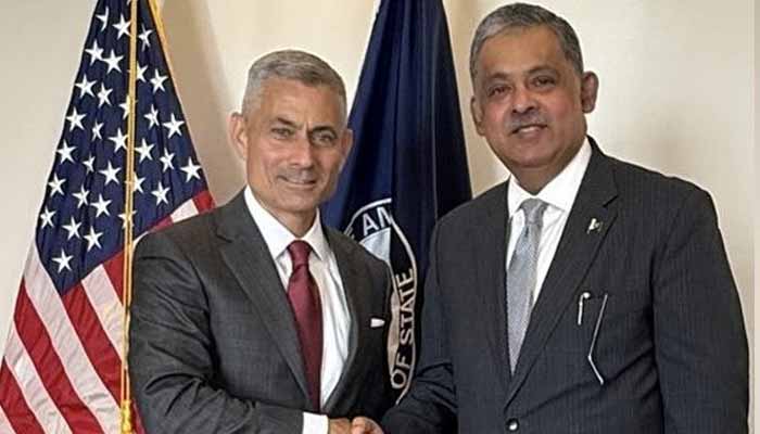 US Assistant Secretary of State for South and Central Asian Affairs Paul Kapur (left) shakes hands with Pakistan’s Ambassador to the US, Rizwan Saeed Sheikh at the State Department in Washington DC, US, on November 7, 2025. —X/State_SCA